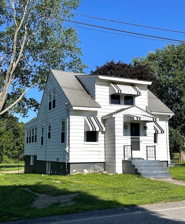 912 Pleasant St, Somerset, MA 02726 - view of front facade featuring a front yard and a shingled roof