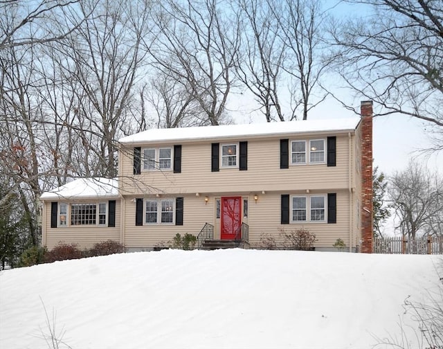 colonial home with a chimney