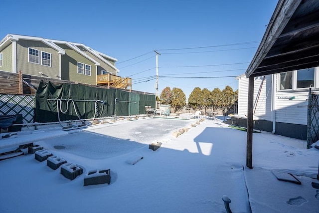 view of yard covered in snow