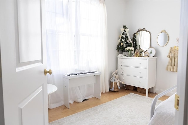 bedroom featuring light wood finished floors