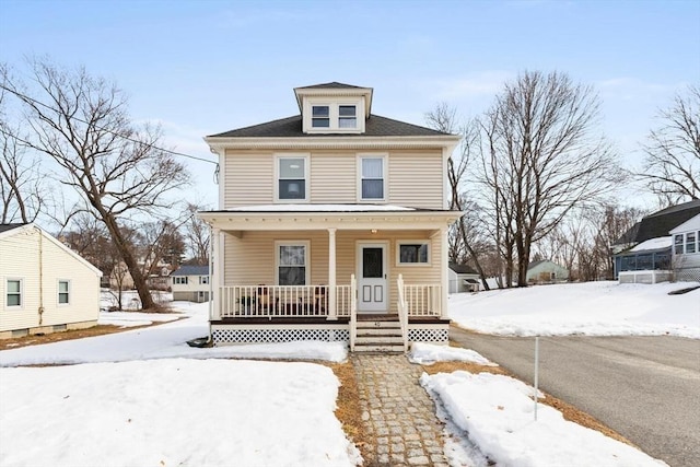 traditional style home with covered porch