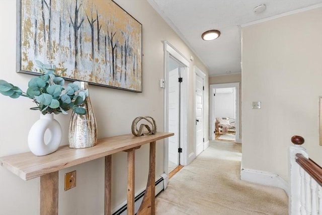 corridor with baseboards and light colored carpet