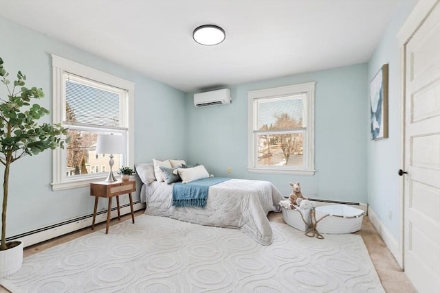 bedroom featuring an AC wall unit, baseboards, and baseboard heating