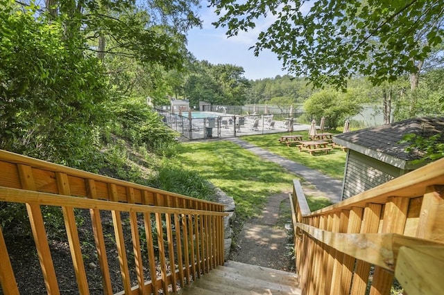 7 Thayer Pond Dr Unit 11, Oxford, MA 01537 - view of community featuring a yard and a pool