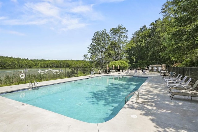 7 Thayer Pond Dr Unit 11, Oxford, MA 01537 - community pool with a patio and view of scattered trees