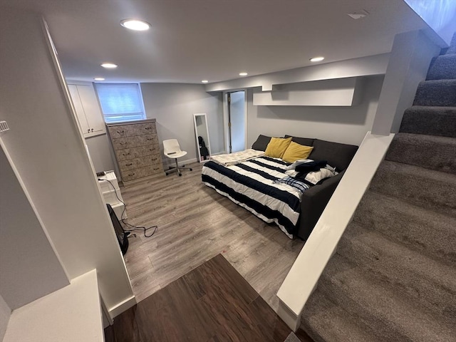 28 Roberts St, Malden, MA 02148 - bedroom with wood finished floors, recessed lighting, and baseboards