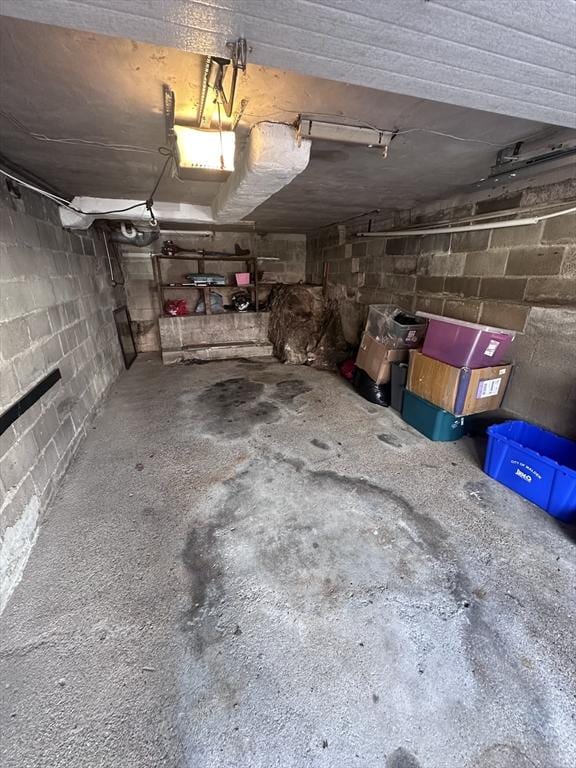 28 Roberts St, Malden, MA 02148 - garage featuring concrete block wall