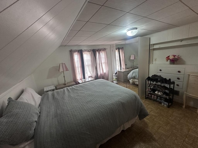 28 Roberts St, Malden, MA 02148 - bedroom with tile patterned floors and vaulted ceiling
