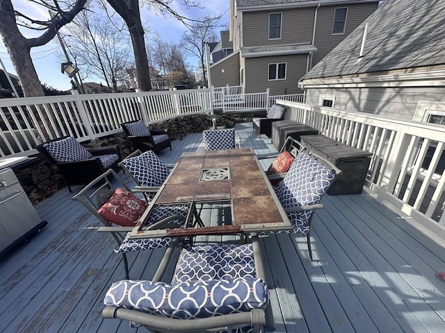 28 Roberts St, Malden, MA 02148 - wooden terrace featuring an outdoor hangout area and outdoor dining space