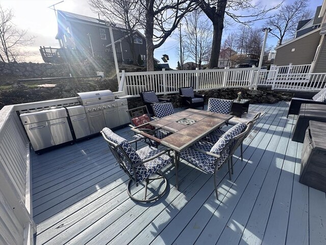 28 Roberts St, Malden, MA 02148 - deck featuring outdoor dining area and a grill