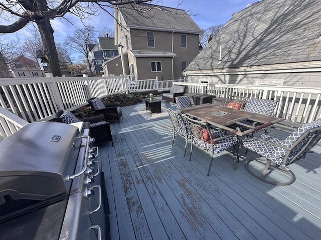 28 Roberts St, Malden, MA 02148 - wooden terrace with outdoor lounge area, outdoor dining area, and grilling area