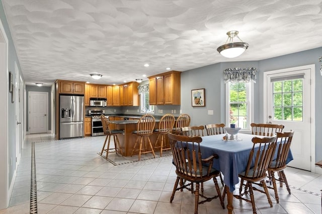 75 Birchwood Rd, Tewksbury, MA 01876 - dining area with light tile patterned floors and recessed lighting