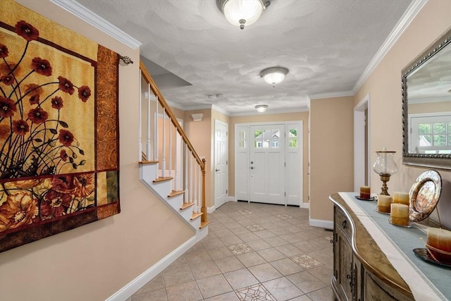 75 Birchwood Rd, Tewksbury, MA 01876 - entryway featuring light tile patterned floors, stairs, and crown molding