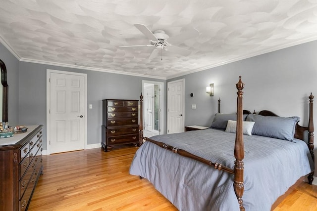 75 Birchwood Rd, Tewksbury, MA 01876 - bedroom with light wood-style flooring, a ceiling fan, and ornamental molding