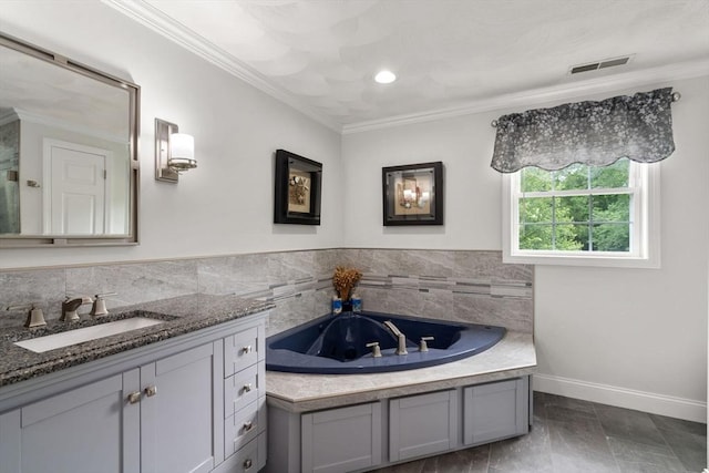 75 Birchwood Rd, Tewksbury, MA 01876 - full bathroom with vanity, a garden tub, and crown molding