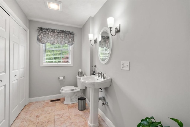 75 Birchwood Rd, Tewksbury, MA 01876 - bathroom with toilet and a closet