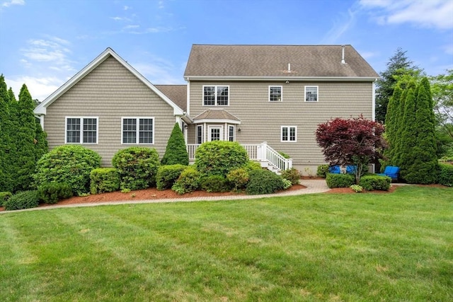 75 Birchwood Rd, Tewksbury, MA 01876 - back of property featuring a lawn