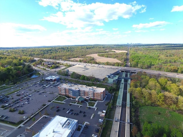 bird's eye view featuring a view of trees