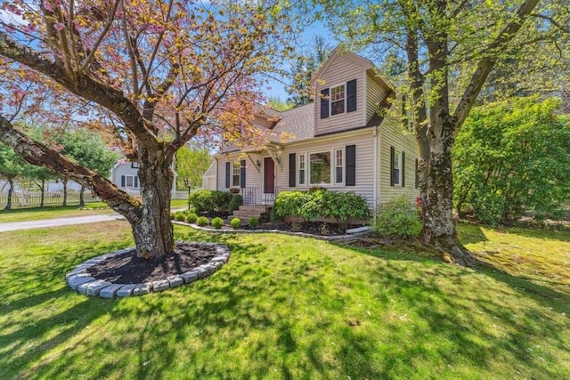 view of front of home featuring a front lawn