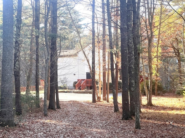 view of yard with a wooden deck