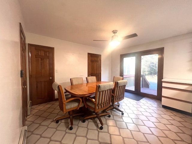 dining space featuring a baseboard radiator and ceiling fan