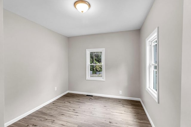 3 Aspen Ct, Ware, MA 01082 - empty room with wood finished floors and baseboards