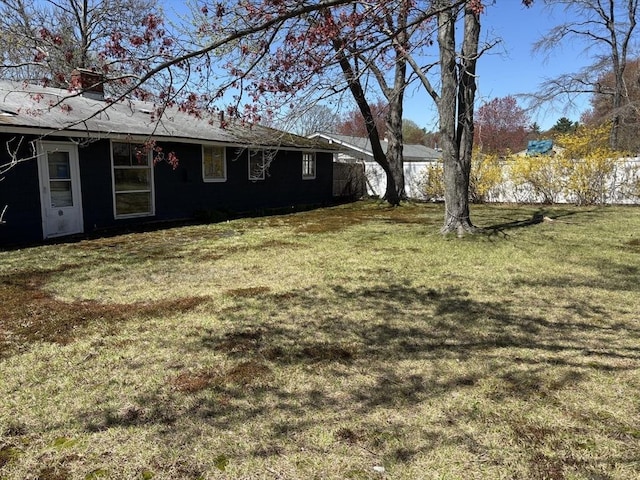view of yard with fence