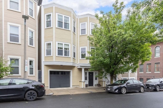 474 E 3rd Unit 2, Boston, MA 02127 - view of property with a garage