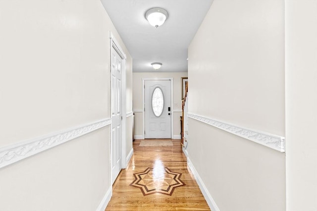 doorway with hardwood / wood-style floors