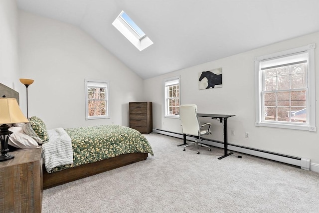 carpeted bedroom with baseboard heating and lofted ceiling with skylight