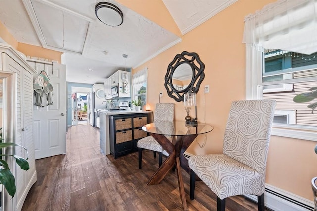 12 Moreland Ave, Hull, MA 02045 - dining area featuring attic access, a baseboard heating unit, dark wood-style flooring, and ornamental molding