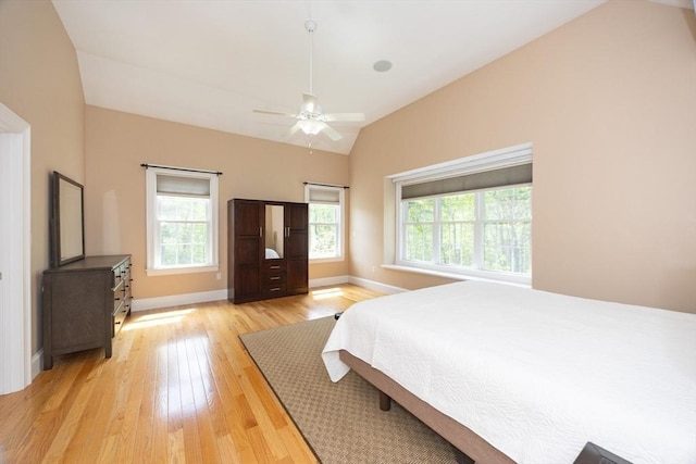 2 Powers Rd, Mendon, MA 01756 - bedroom featuring vaulted ceiling, multiple windows, light wood-type flooring, and baseboards