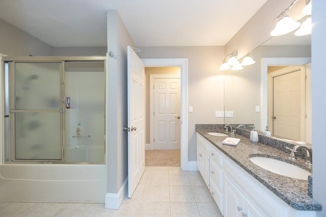 2 Powers Rd, Mendon, MA 01756 - bathroom with baseboards, double vanity, tile patterned floors, and combined bath / shower with glass door