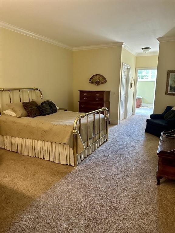 carpeted bedroom with ornamental molding