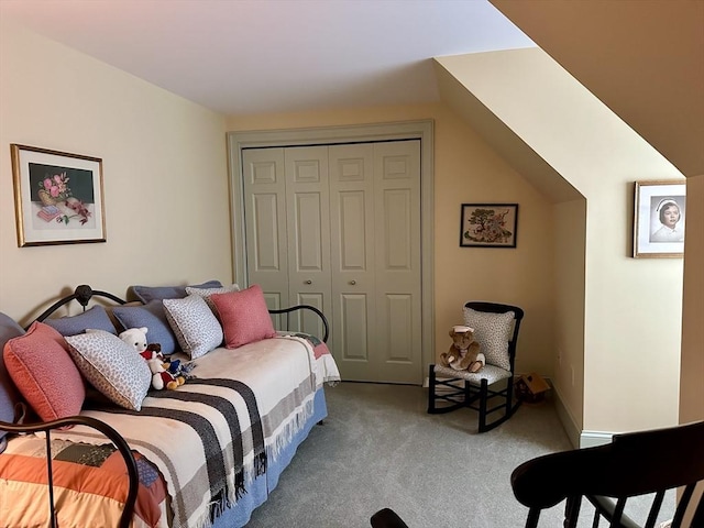 carpeted bedroom featuring a closet