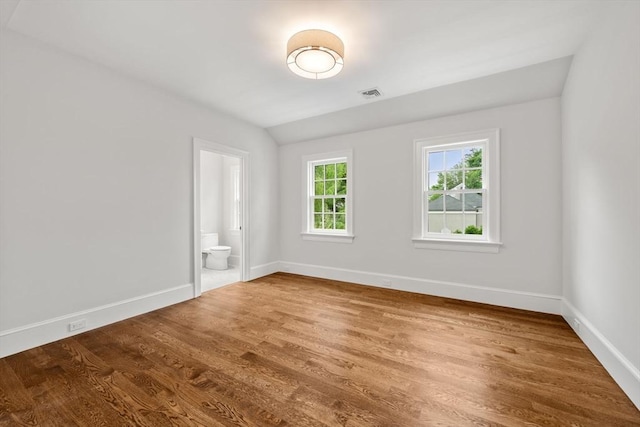 61 Heath St, Brookline, MA 02445 - empty room featuring baseboards and wood finished floors