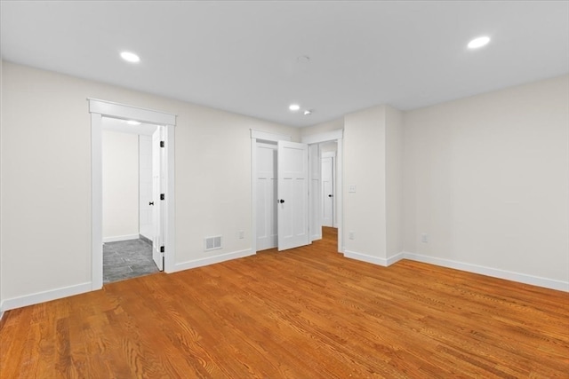 unfurnished bedroom featuring light hardwood / wood-style floors