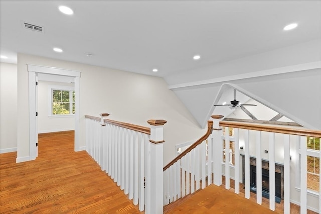 corridor featuring light hardwood / wood-style floors