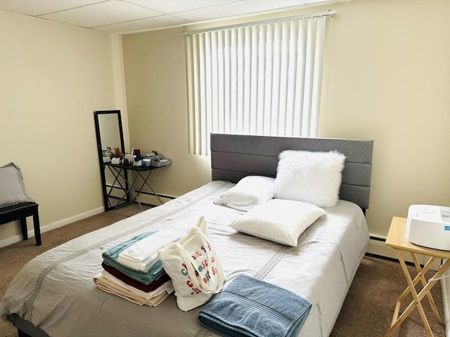 bedroom featuring dark colored carpet