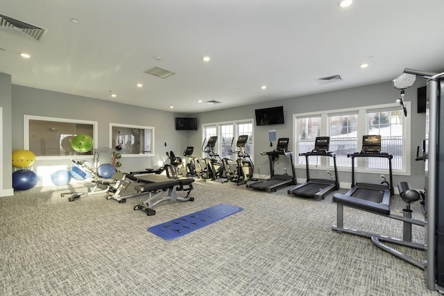 exercise room featuring recessed lighting, visible vents, and carpet floors