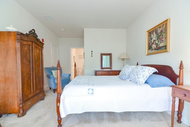 bedroom featuring light colored carpet and visible vents