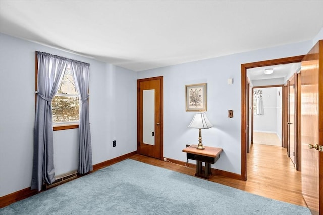 unfurnished room with light colored carpet