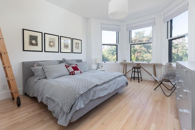 bedroom featuring light hardwood / wood-style flooring