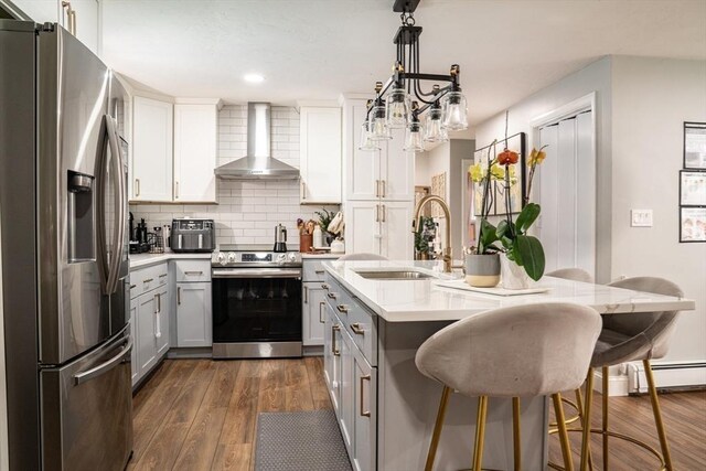22 Hillsdale Rd, Holbrook, MA 02343 - kitchen featuring appliances with stainless steel finishes, wall chimney exhaust hood, gray cabinetry, light countertops, and recessed lighting