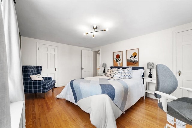 bedroom featuring light wood finished floors