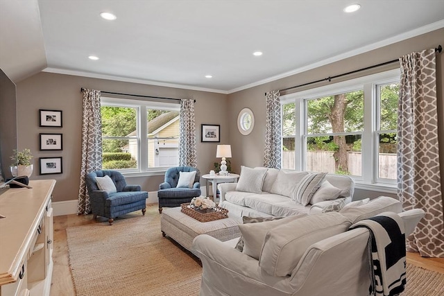 59 Elm St, Concord, MA 01742 - living room with light wood-style floors, recessed lighting, ornamental molding, baseboards, and lofted ceiling