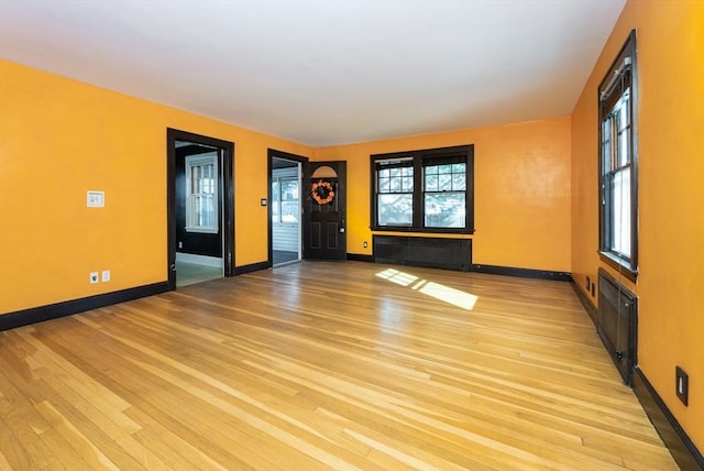 empty room featuring light hardwood / wood-style floors