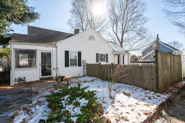 view of snow covered property