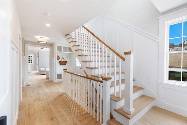 2 Candle House Ln, Nantucket, MA 02564 - stairway featuring a decorative wall and hardwood / wood-style floors