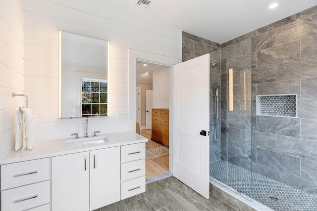 2 Candle House Ln, Nantucket, MA 02564 - bathroom with vanity, recessed lighting, visible vents, and walk in shower